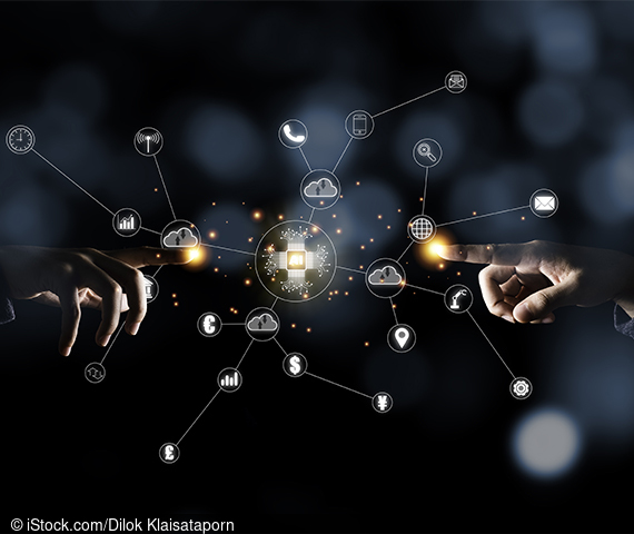  Symbol image with connected technologies between two hands. 