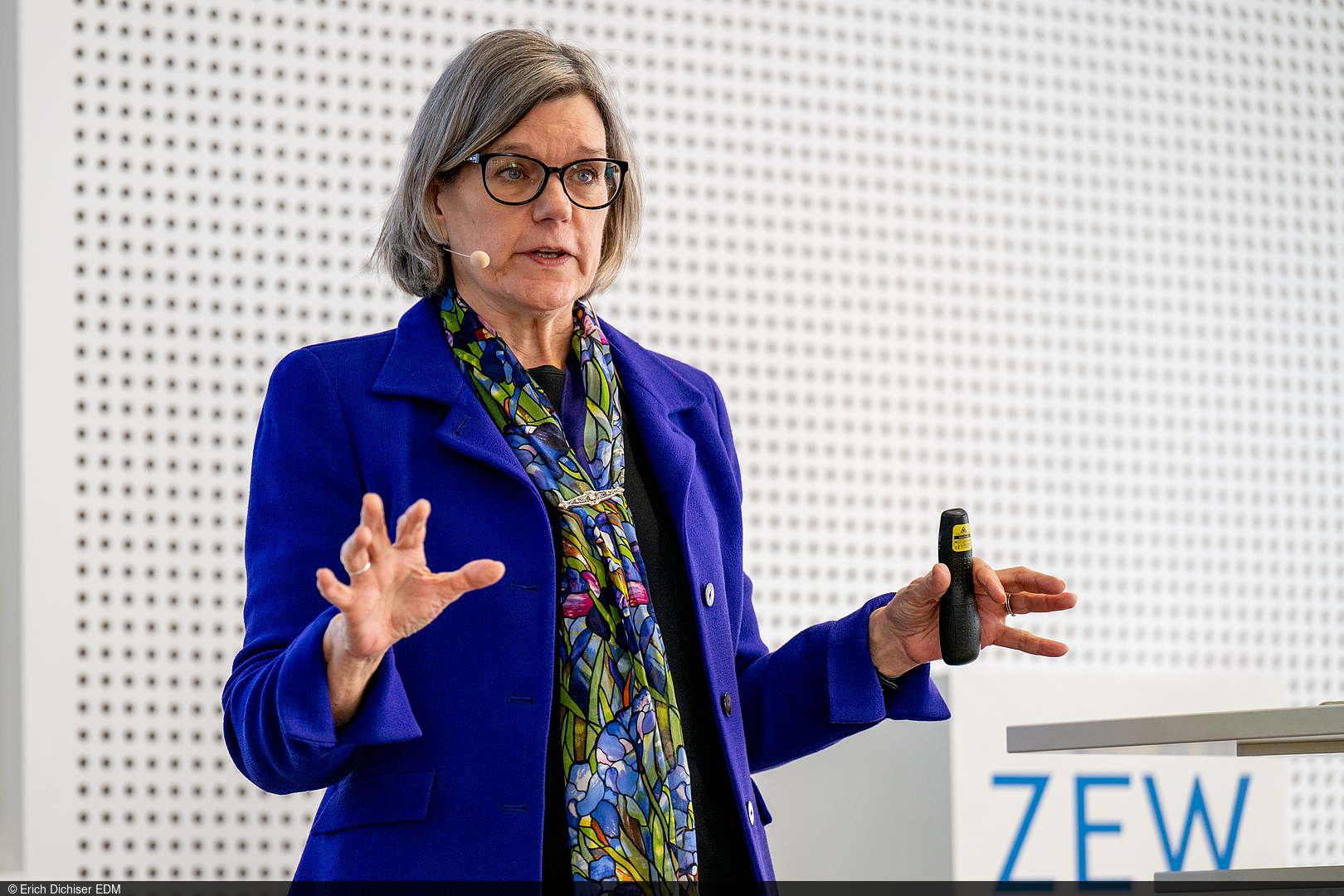 Nancy Rose, PhD during her keynote on the podium
