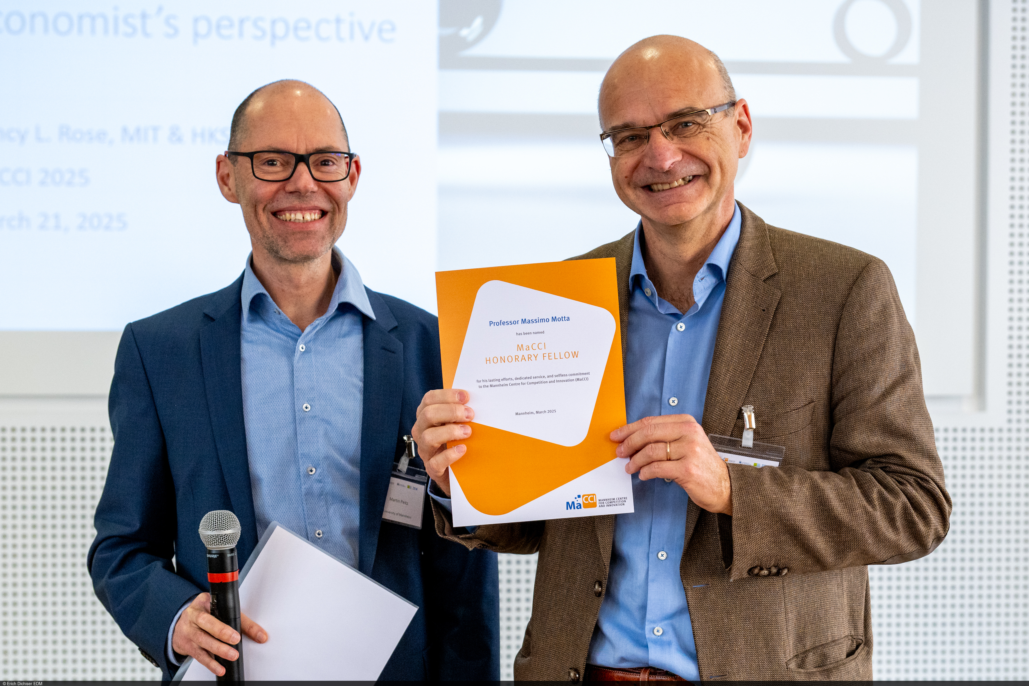 Prof. Dr. Martin Peitz und Prof. Massimo Motta