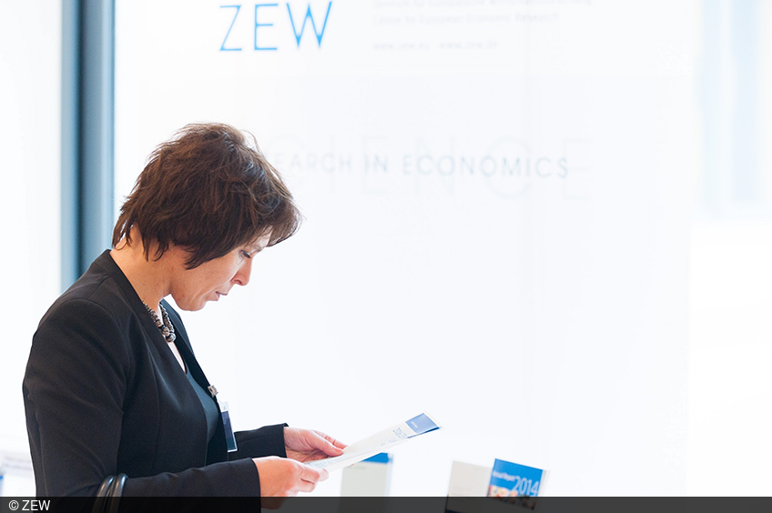 An audience member of the ZEW Lunch Debate in Brussels examines the programme