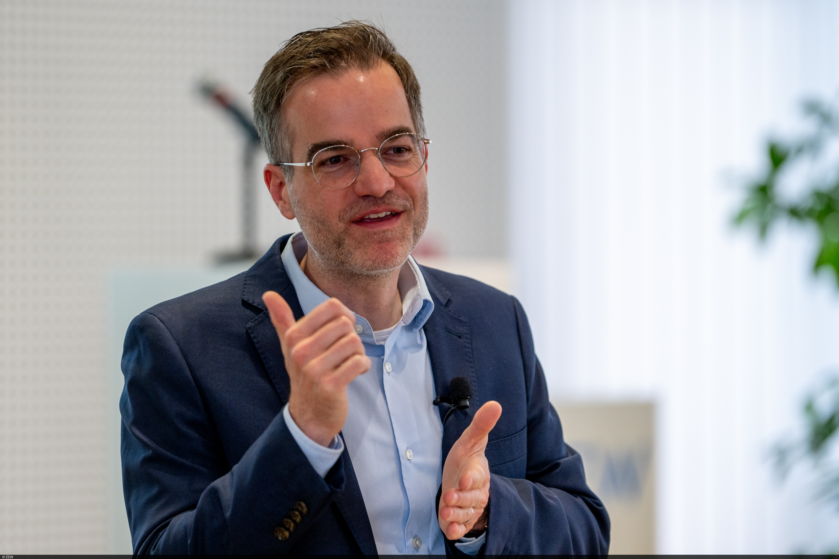 Photo of Tobias Berg during his keynote speech